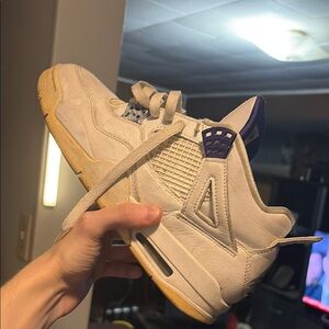 Jordan 4’s metallic purple used.